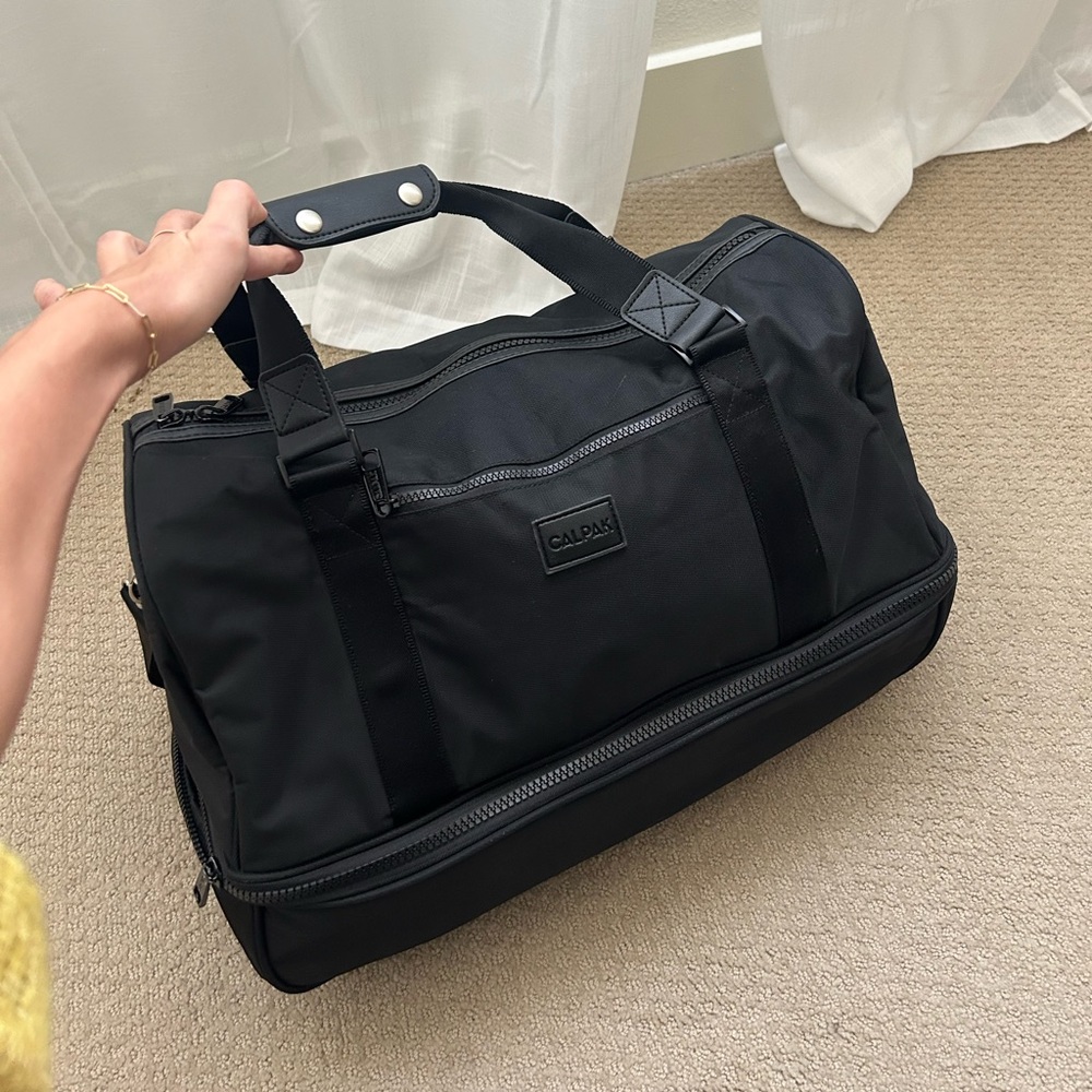 CALPAK Stevyn Duffel Bag with Shoe Compartment in Black